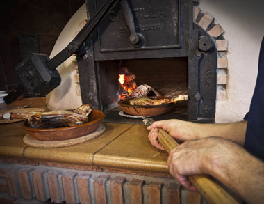 Horno de leña Lechazo Asado en horno de leña